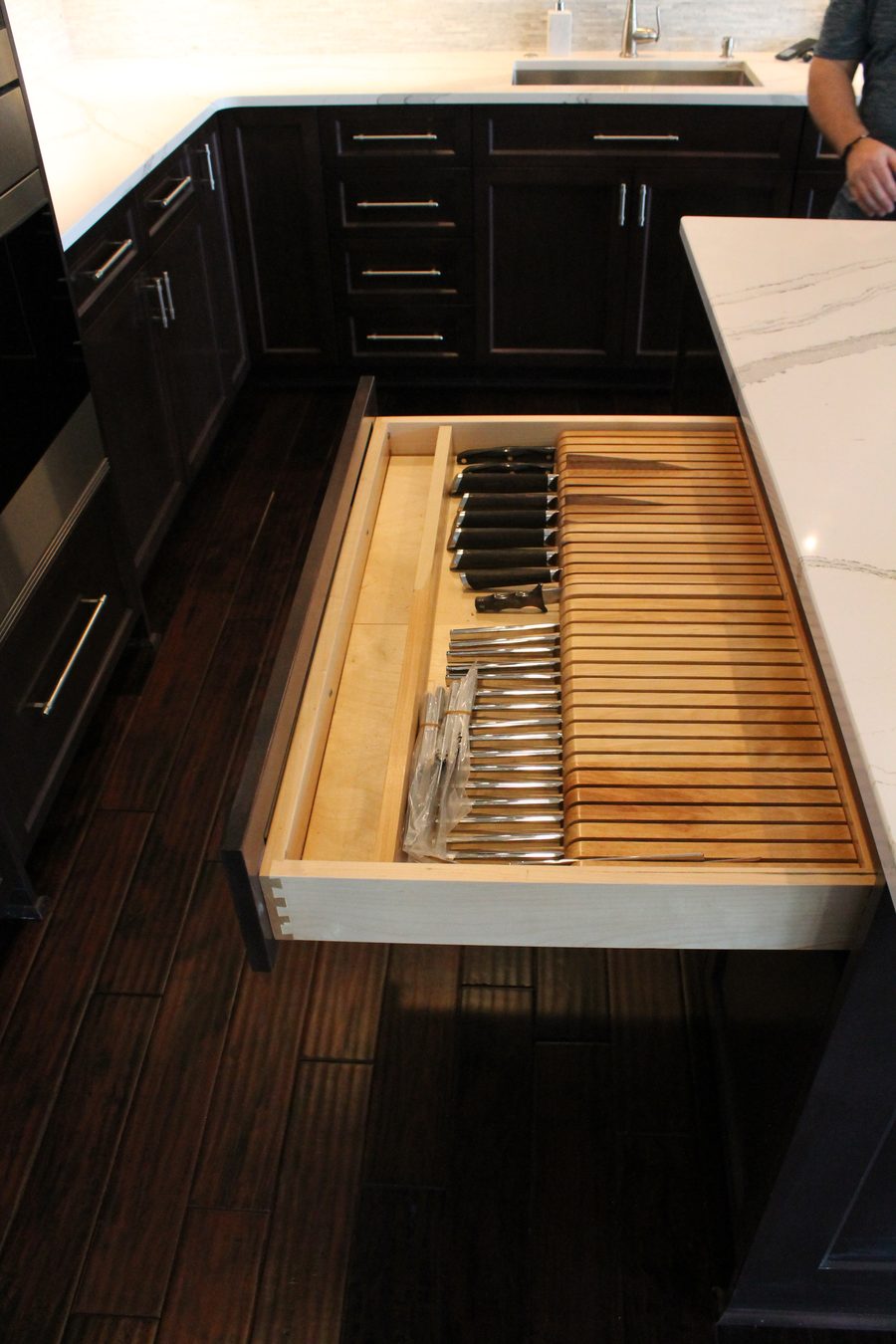 Custom pull-out storage fitted into the cabinetry